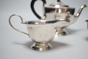 A George V silver three piece tea set, Viners Ltd, Sheffield, 1931, gross 21.8oz.